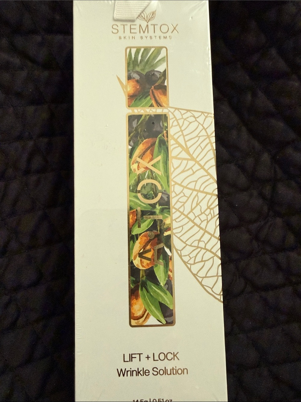 STEMTOX Lift + Lock Wrinkle Solution - White & Gold Packaging